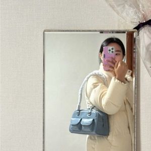 Stand oil chubby bag